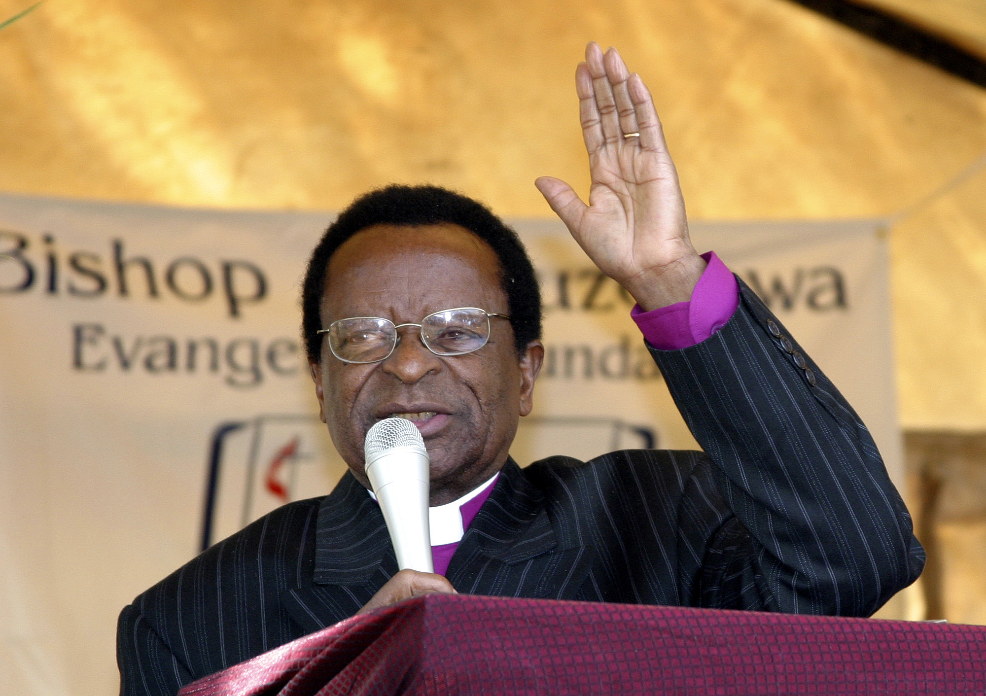 Bishop Abel T. Muzorewa says the time to win people to Christ is now during a celebration at the Old Mutare Mission in Zimbabwe in 2005. People gathered from all over Africa and the world to celebrate his 60 years of ministry and the launching of the Bishop A.T. Muzorewa Evangelism Foundation. Muzorewa died April 8, 2010. He was 84. A UMNS file photo by Kathy L. Gilbert.