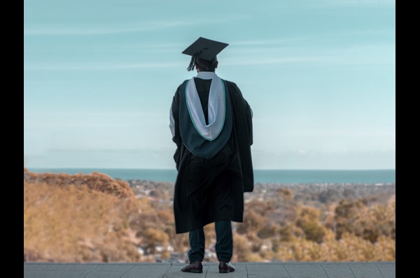One United Methodist teen, nearing high school graduation, ponders lessons learned during the pandemic-era ending of his senior year. Photo by Terrence  Thomas (@tezthomz) at Unsplash