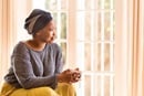 Woman contemplates in silence